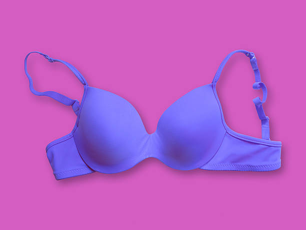 istock blue bra on purple background (pop art) 485755646