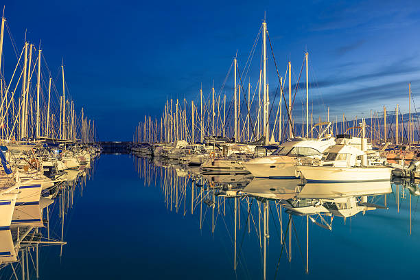 Port on Mediterranean Sea with luxury sailboats and yachts. 
