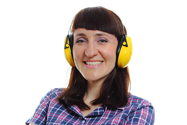 istock Builder woman wearing protective headphones 485761492