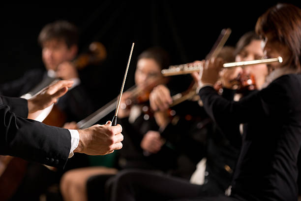 dirigent regie symphony orchestra - dirigent stock-fotos und bilder