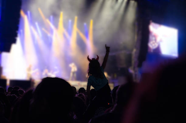 istock Rear view of crowd at music concert 485765764