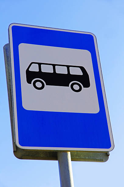 istock Bus stop sign against of blue sky. 485766690