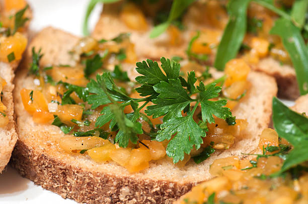 istock Italian bruschetta with yellow tomatoes 485768716