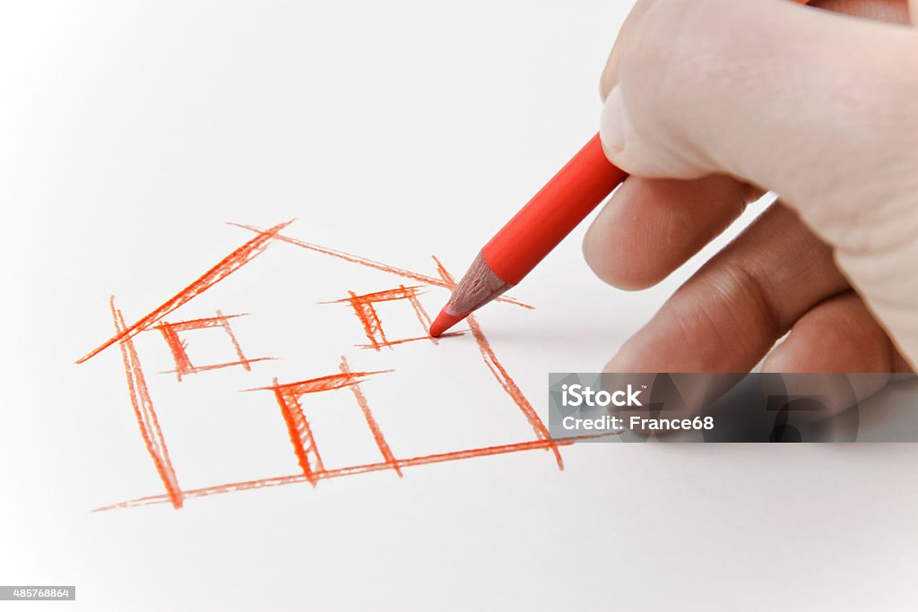 Hand drawing an house Hand drawing an house with a pencil on white sheet Drawing - Activity Stock Photo