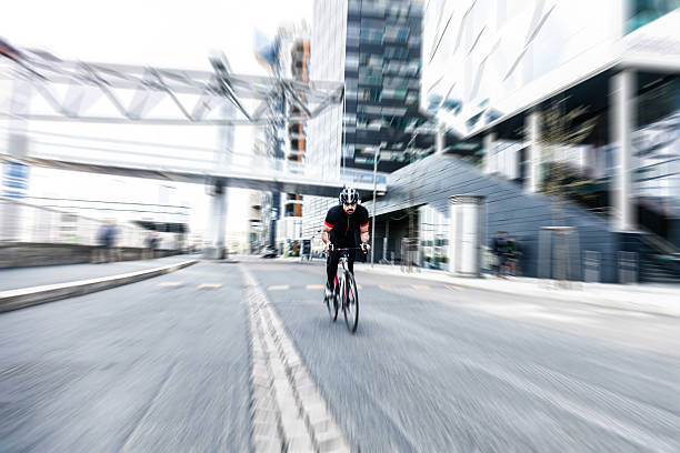 istock Commuter cycling fast at work in the morning 485768944