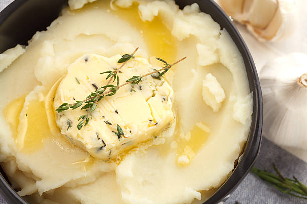 mashed potato compound butter herb baguette thyme rosemary coriander oregano mashed potato compound butter herb baguette thyme rosemary coriander oregano fresh chopped homemade food snack tasty Cup of Mashed Potatoes stock pictures, royalty-free photos & images