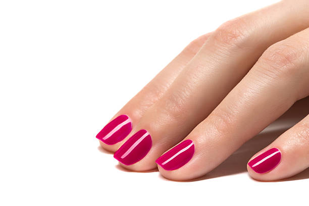 istock Woman hands with manicured pink nails 485773185