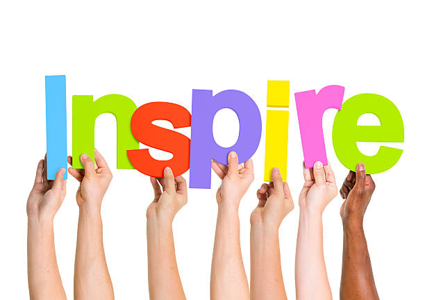 istock Multi-Ethnic Group Of People Holding The Word Inspire 485775187