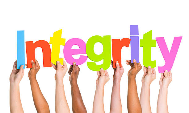 istock Multi-Ethnic Group Of People's Arms Raised Holding Letters That 485775189