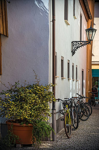 istock small alley with bicycles and restaurants 485775681