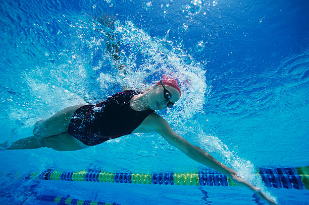 istock Young Woman Swimming in Pool 485776175