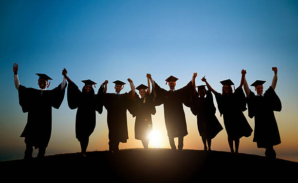istock Group Of Diverse International Students Celebrating Graduation 485776945