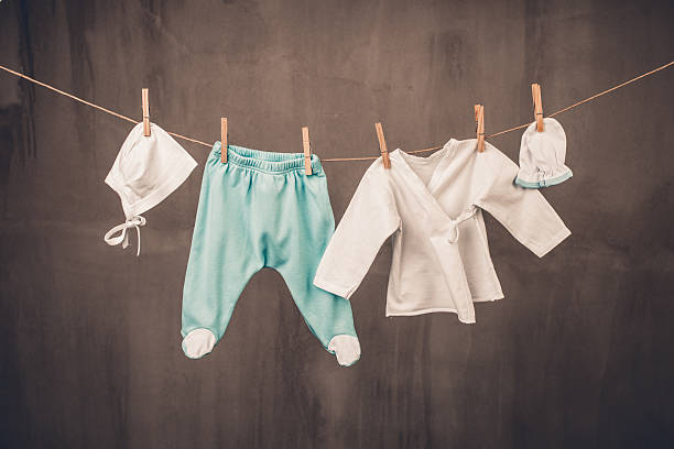istock Baby clothes hanging on the clothesline 485779168
