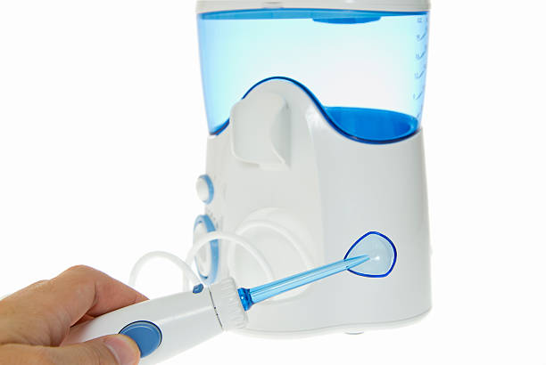 istock Brushing Teeth, Massage Gums. Irrigator for Oral Cavity Cleaning 485779864