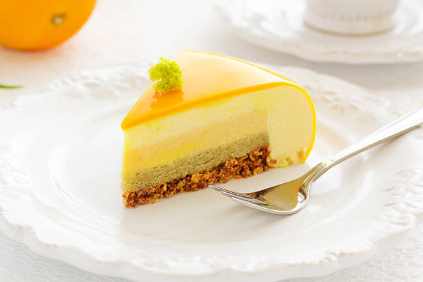 istock Cake with orange mousse and almond krokantom 485780838
