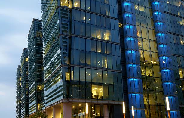 istock Office buildings lit up at night 485783650