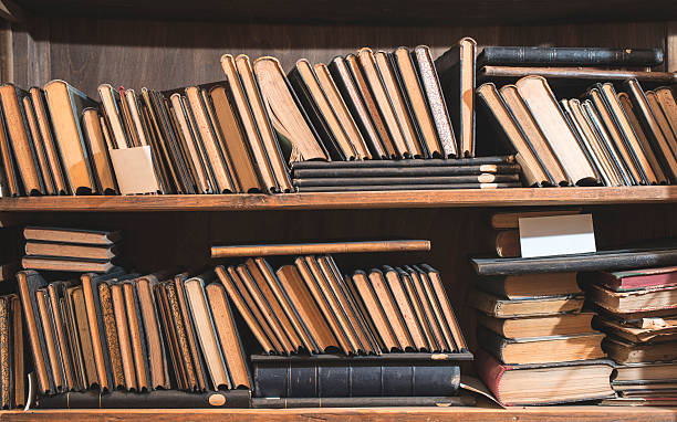 istock Old books in a vintage library 485783844