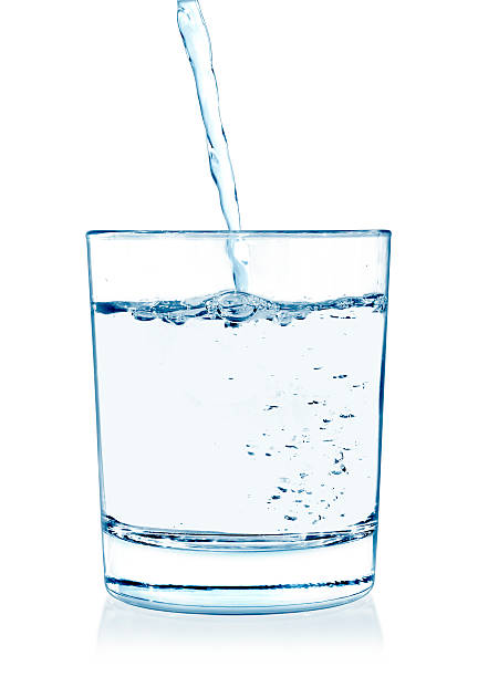 istock Clear water being poured into a glass cup. 485791550