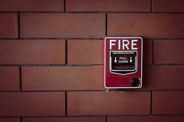 istock fire alarm on brick wall vintage style 485791890