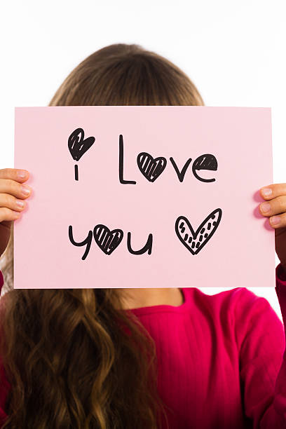 istock Child holding I Love You sign 485792278