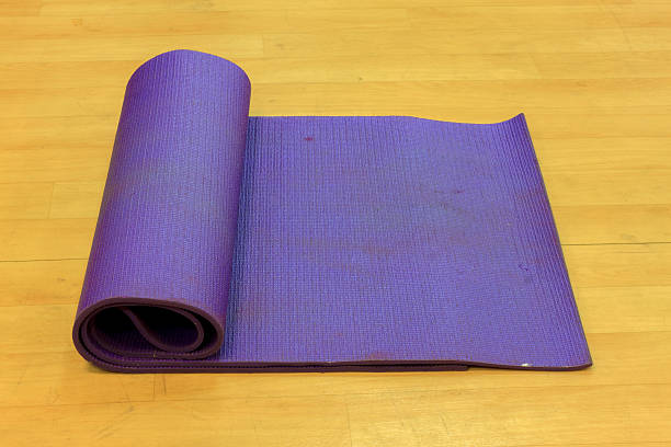 istock Yoga mat on wood background. 485793738