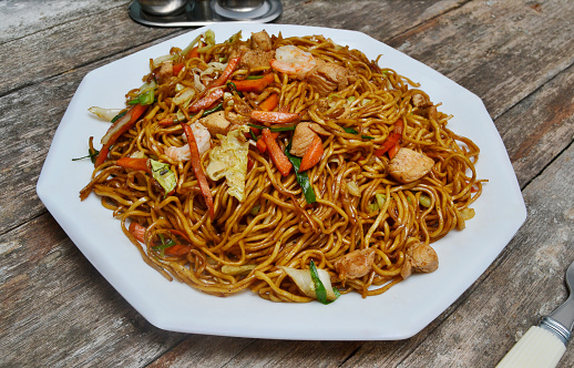 large plate of fried noodle garnish