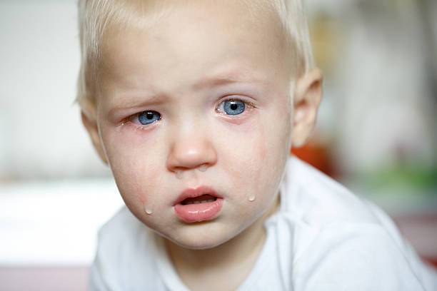 istock Small, crying toddler in pain 485797436