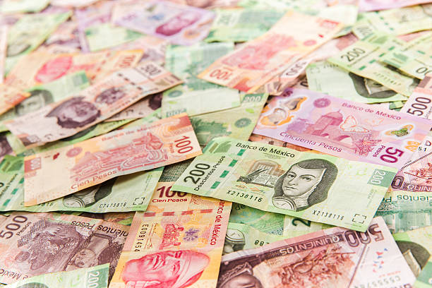 Mexican money background / selective focus stock photo