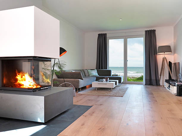 seaside moderna sala de estar con chimenea. - fireplace living room door wall fotografías e imágenes de stock