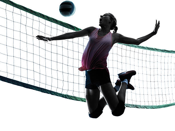 woman バレーボール選手絶縁型シルエット - volleying sport indoors action ストックフォトと画像