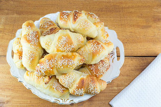istock Homemade pastry with sesame on the white plate 485803564