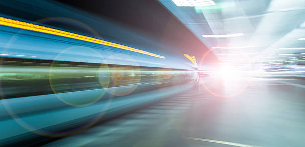 istock fast train traveling at high speed through a station 485805102