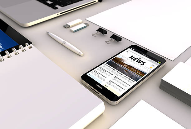 istock news smartphone office 485805216