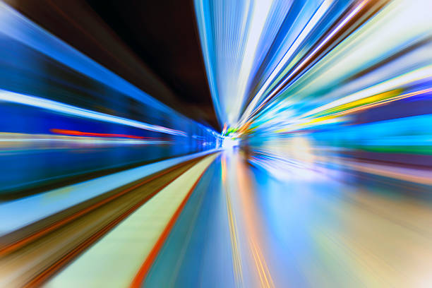 istock fast train traveling at high speed through a station 485806530