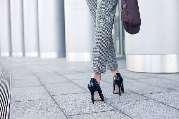 istock Elegant young businesswoman is going to work 485811594