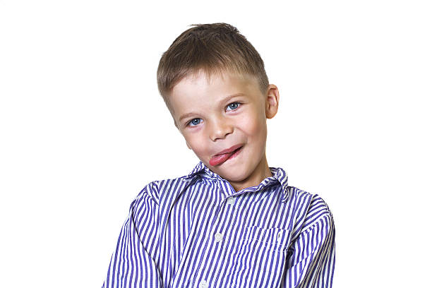 Funny 6yearold Boy Showing Tongue Stock Photo - Download Image Now - 2015,  Blond Hair, Boys - iStock