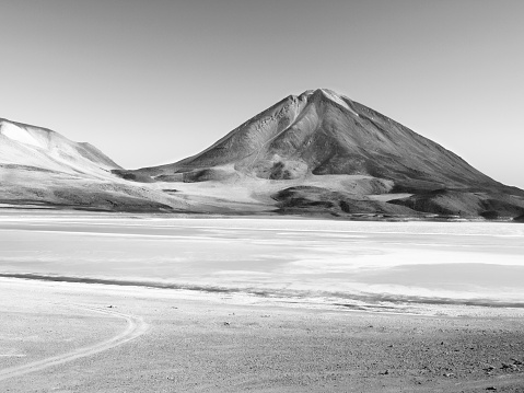 Laguna Verde with high volcano Licancabur on a background, Bolivia, black and white image