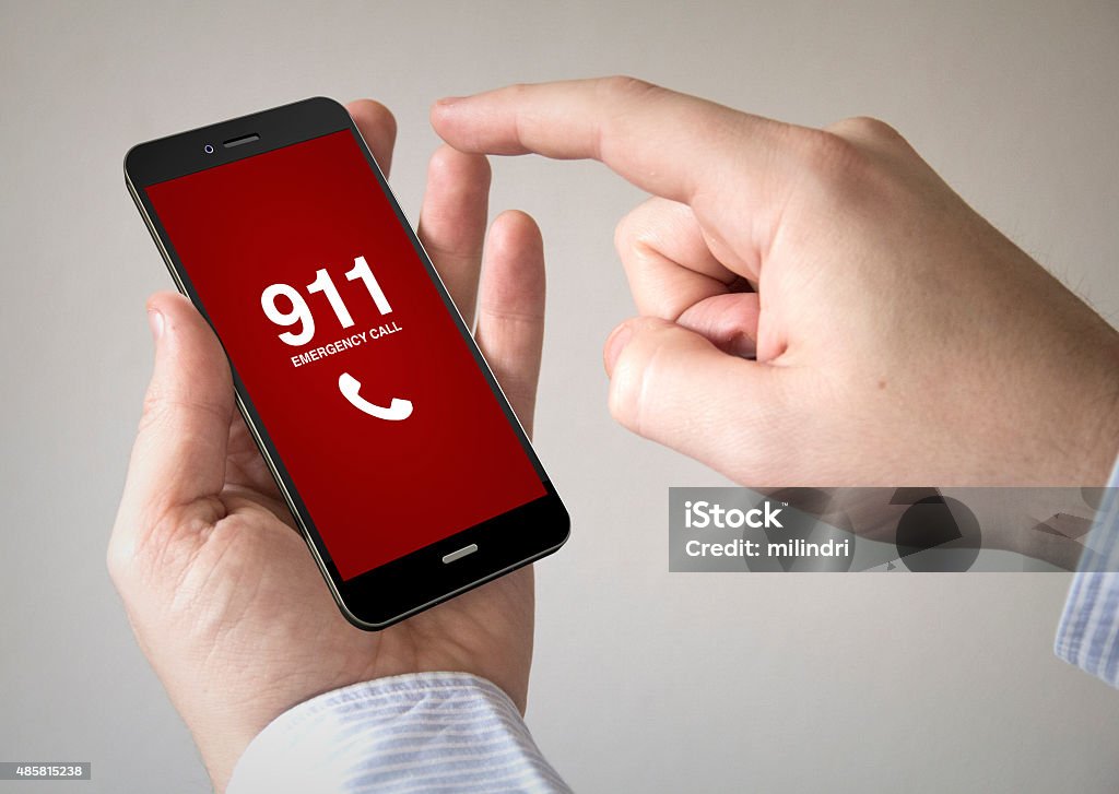 touchscreen smartphone with emergency call on the screen Close up of man using 3d generated mobile smart phone with emergency call on the screen. Screen graphics are made up. Emergency Services Occupation Stock Photo