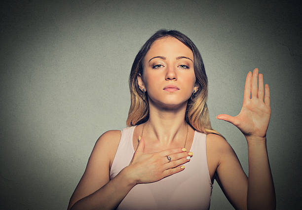 istock confident woman making a promise 485815272