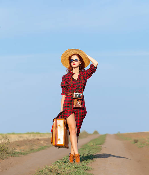 istock girl with bag and retro camera 485815406