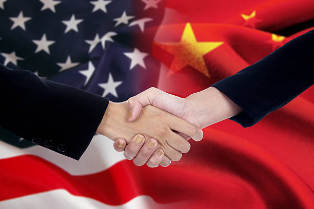 istock Businesspeople shaking hands after negotiation 485817098
