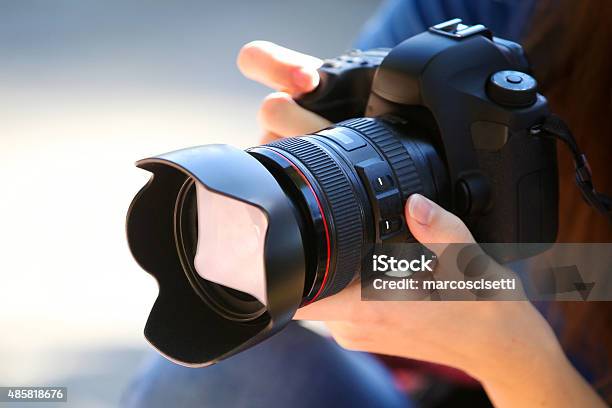 Holding A Full Frame Camera Stock Photo - Download Image Now - Photographer, Camera - Photographic Equipment, Expertise