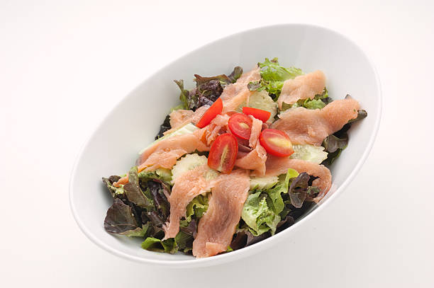 istock Slised smoked salmon with salad leaves 485819214