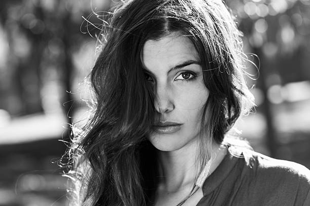 istock Beautiful woman in a urban park 485819562