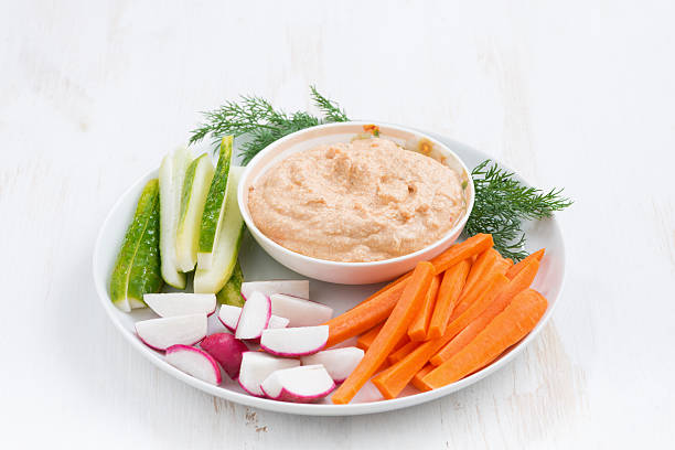 istock tomato sauce with tofu and fresh vegetables on white table 485819700