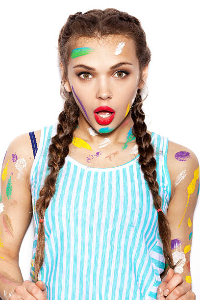 istock Young cheerful soiled in paint girl having fun 485819796