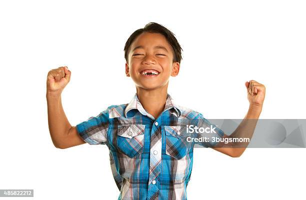 Cute Happy Filipino Boy With Arms In The Air Stock Photo - Download Image Now - Child, Smiling, White Background