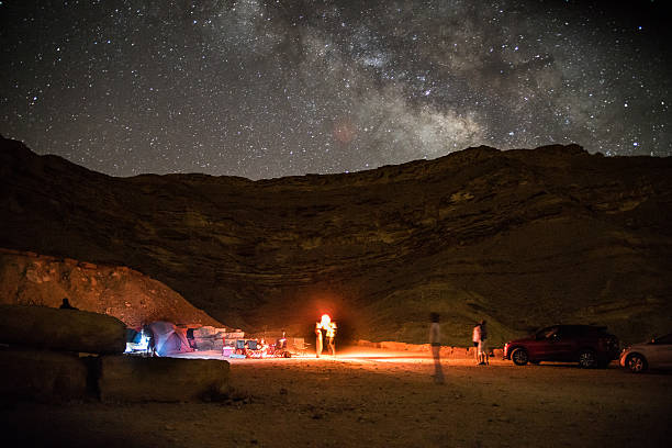 Night camping under stars stock photo