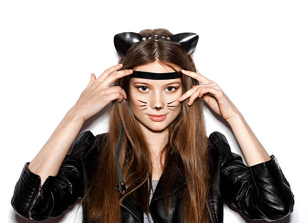 young sexy brunette woman wearing cat ears stock photo