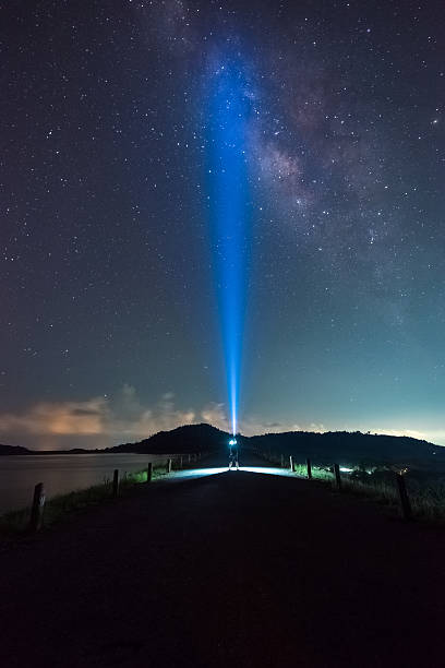 istock People and night sky milky way on background. 485829270